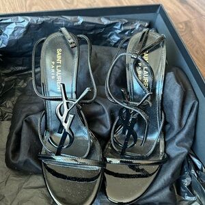 Saint Laurent Cassandra logo embellished patent leather sandal